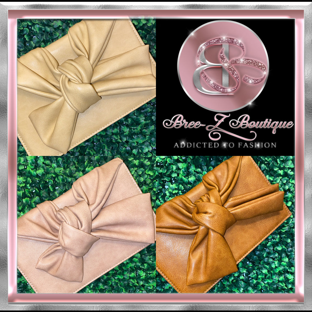 KNOTTED BOW CLUTCH